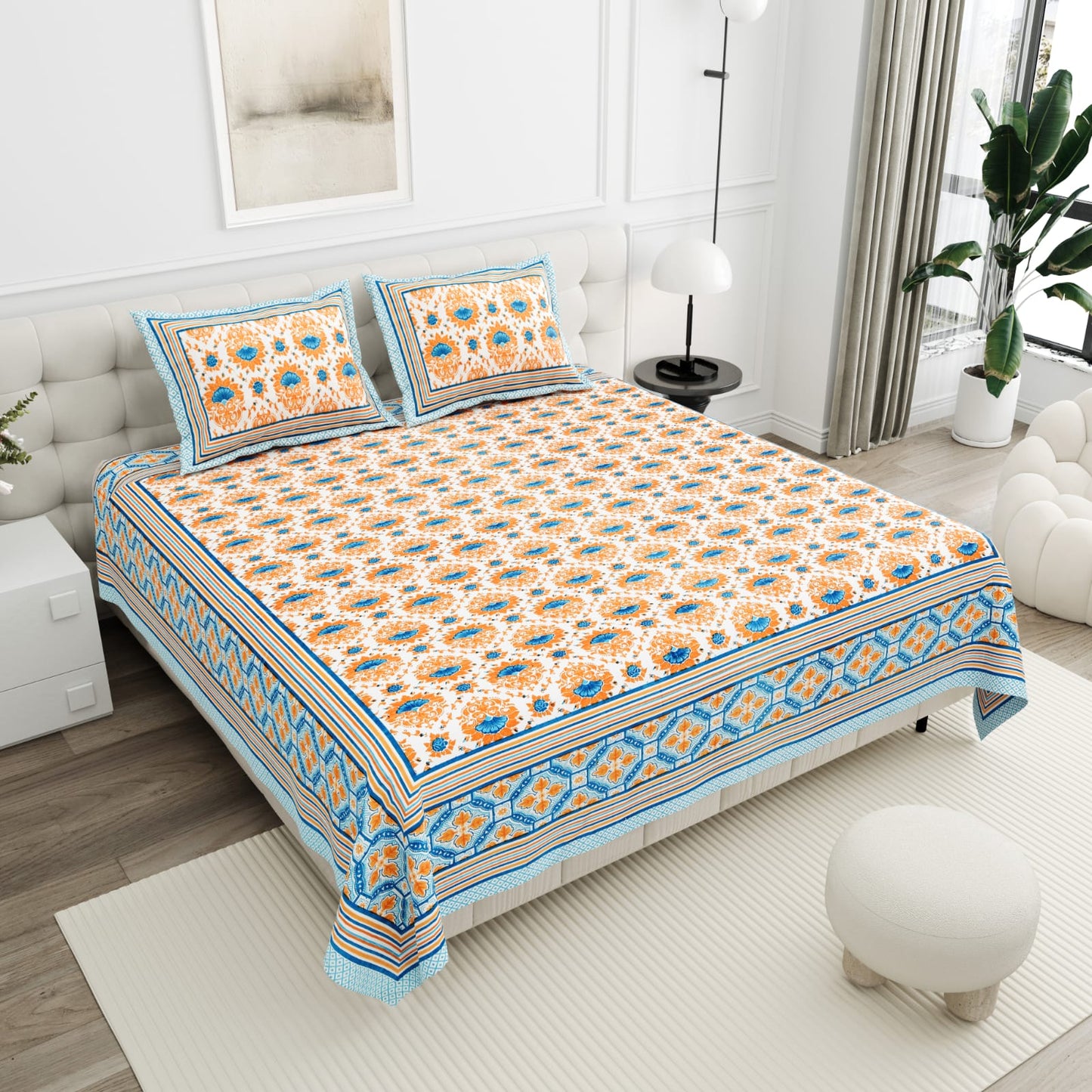 Orange double bed bedsheet set with two pillow covers made of premium cotton