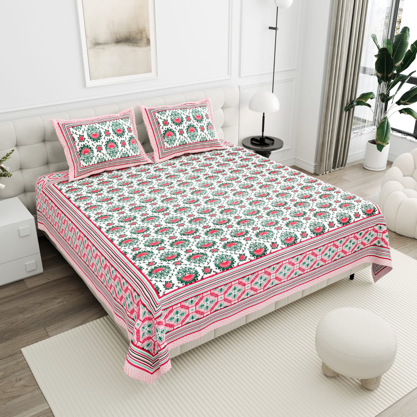 Green pink combination Jaipuri print cotton bedsheet set with pillow covers on double bed