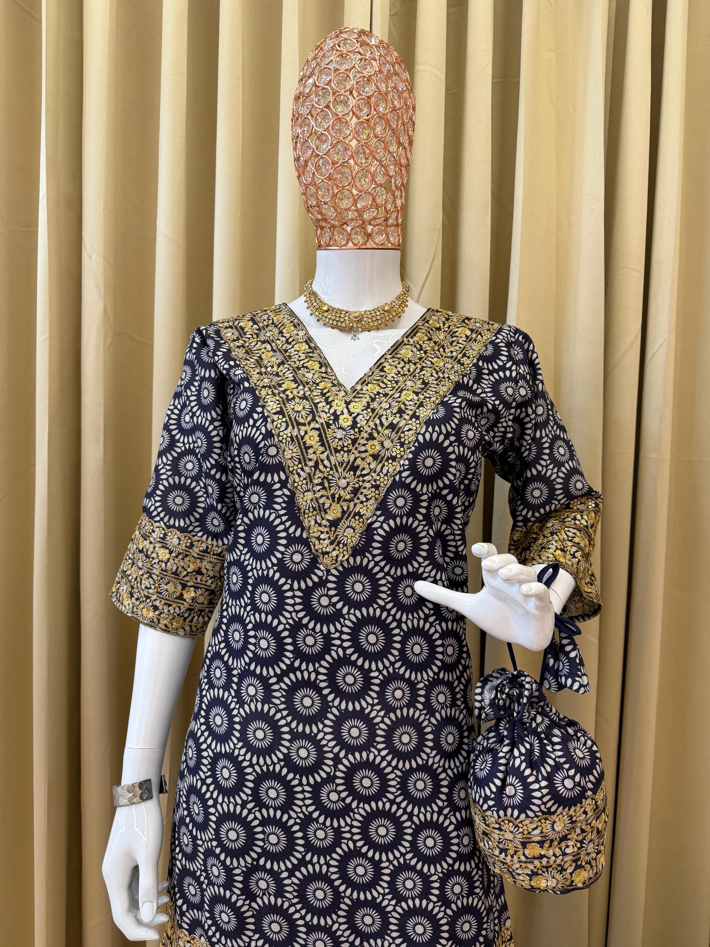 Blue embroidery co-ord set featuring premium mul cotton kurti with detailed neck and daman embroidery, 18-inch sleeves, batwa style top with drawstring, and matching mul cotton pants with fancy lace and stitch detailing.