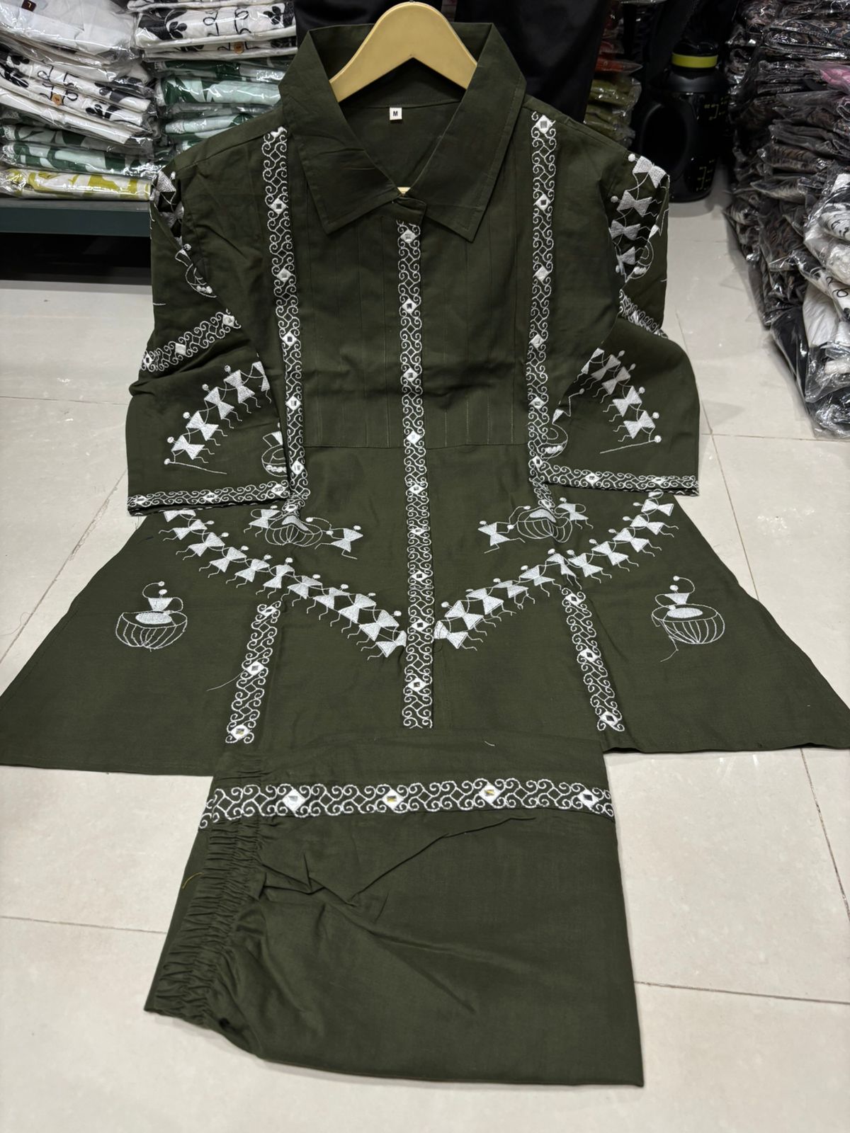 Green cotton co-ord set with intricate embroidery on top and pants