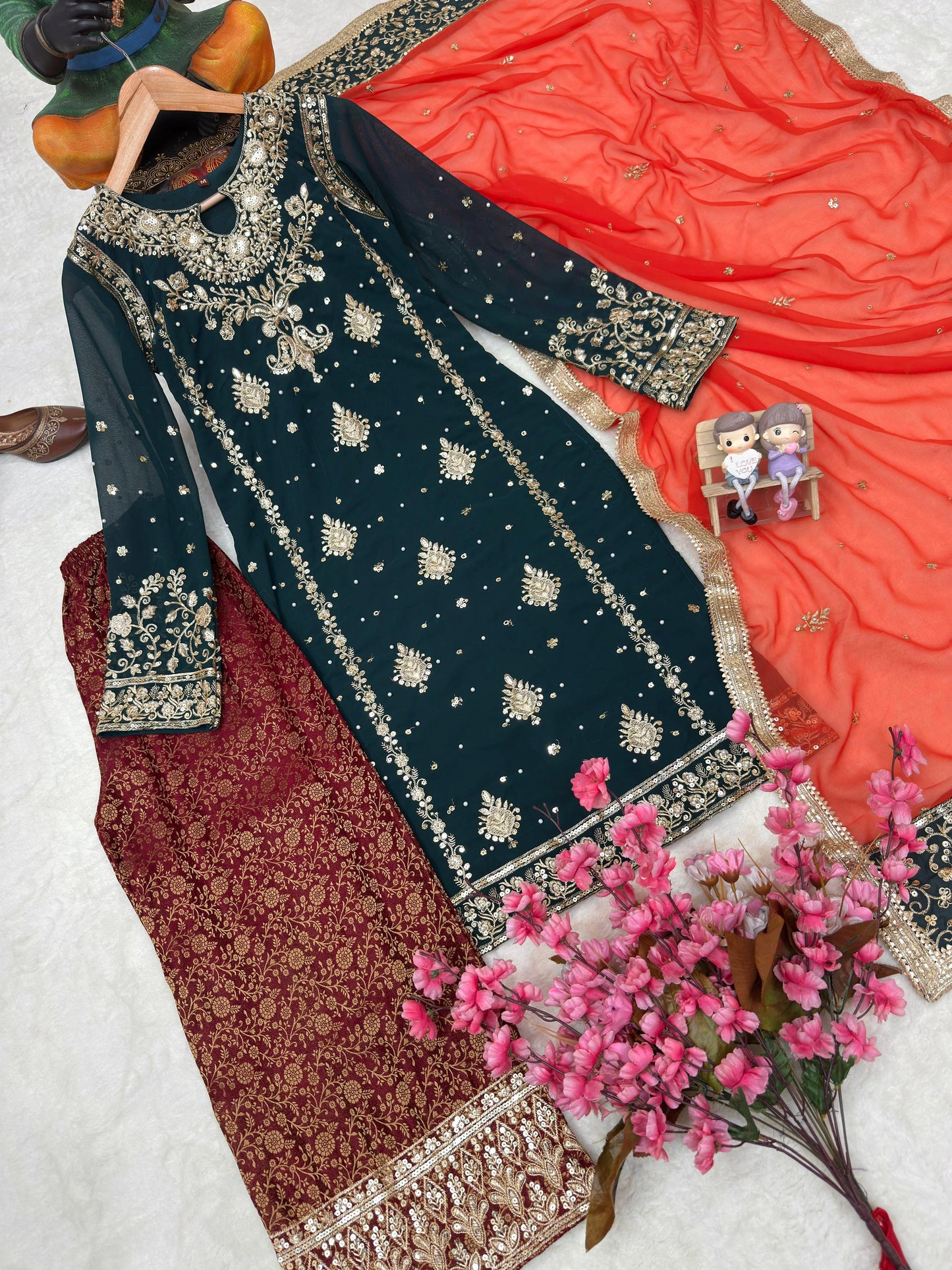 Beautiful FAUX GEORGETTE teal embroidered suit set with kurti, plazzo, and dupatta detailing sequence and zari work