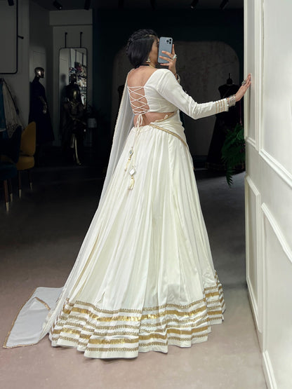 White Lehenga with Golden Borders
