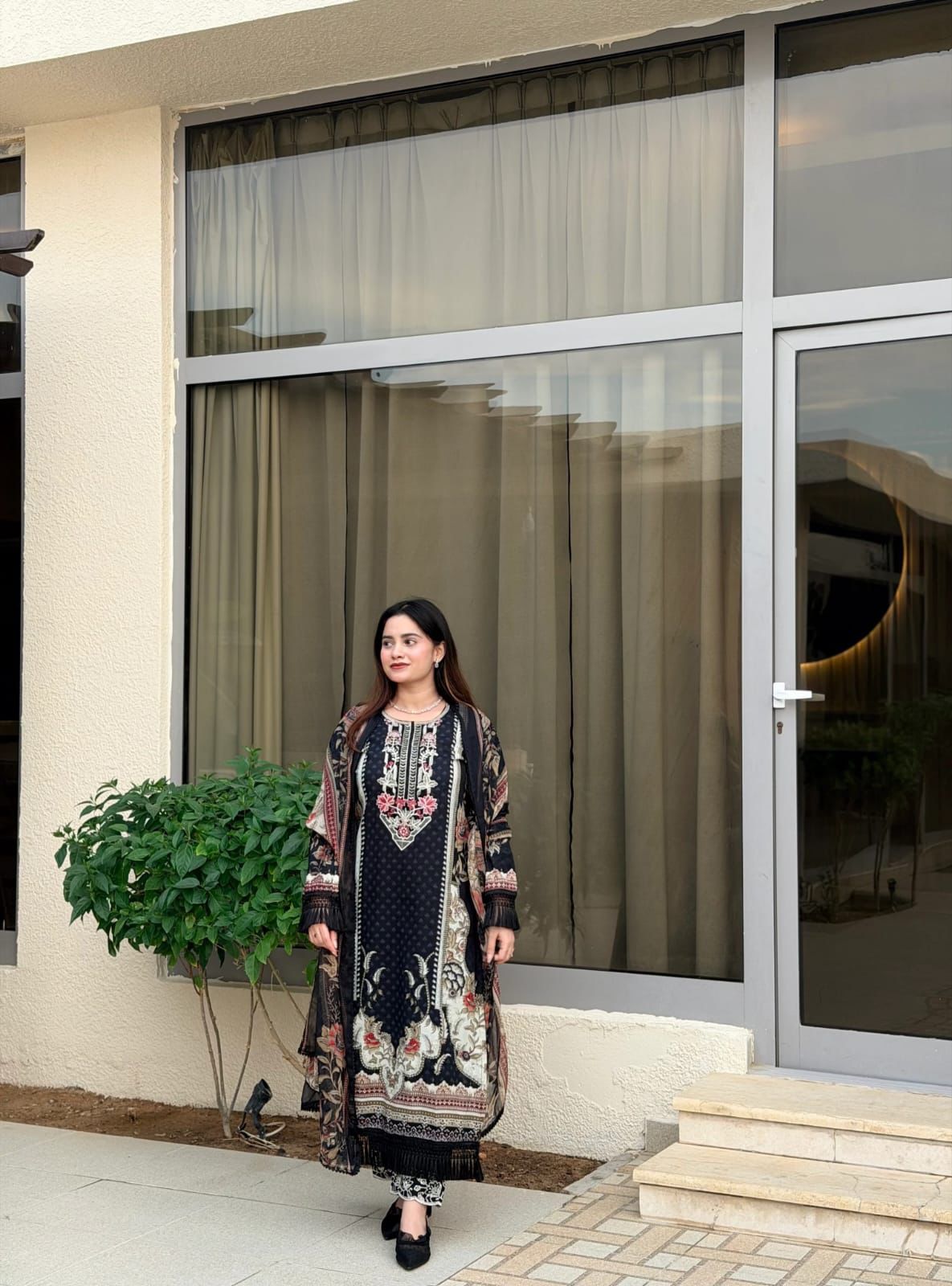 Black pure cotton Pakistani suit with heavy patch work and semi lawn bottom