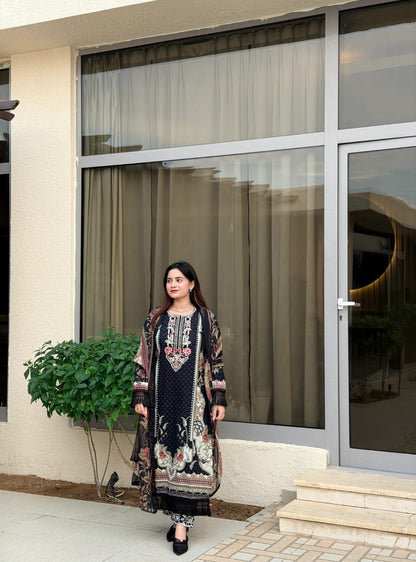 Black pure cotton Pakistani suit with heavy patch work and semi lawn bottom