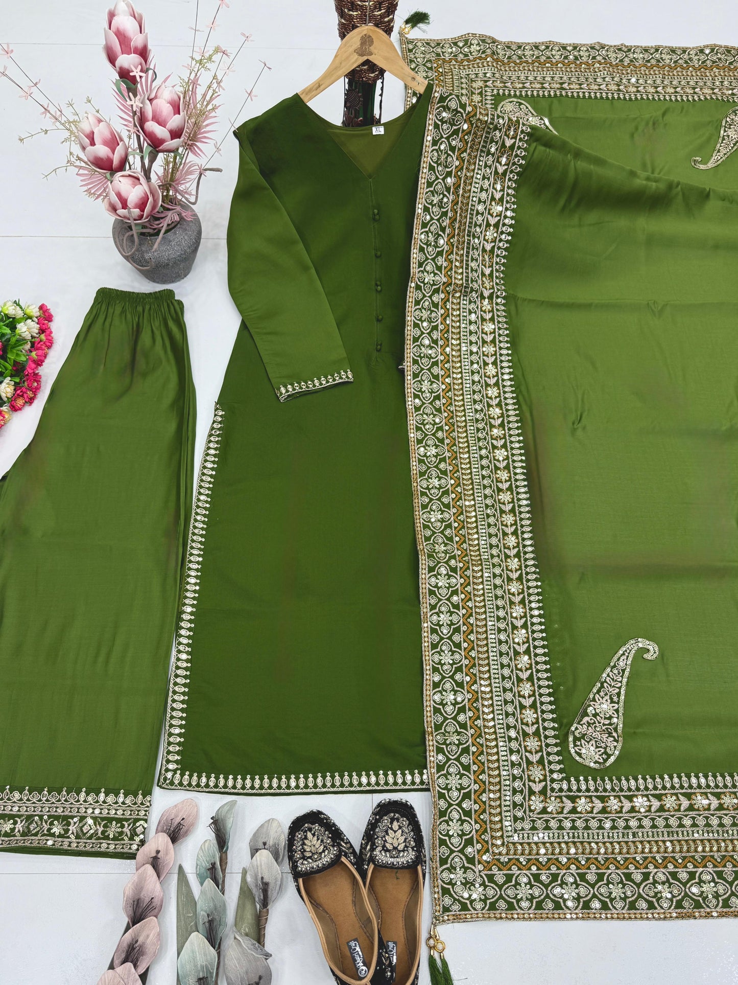 Green Pakistani suit set made of heavy Roman silk with embroidery and sequin work