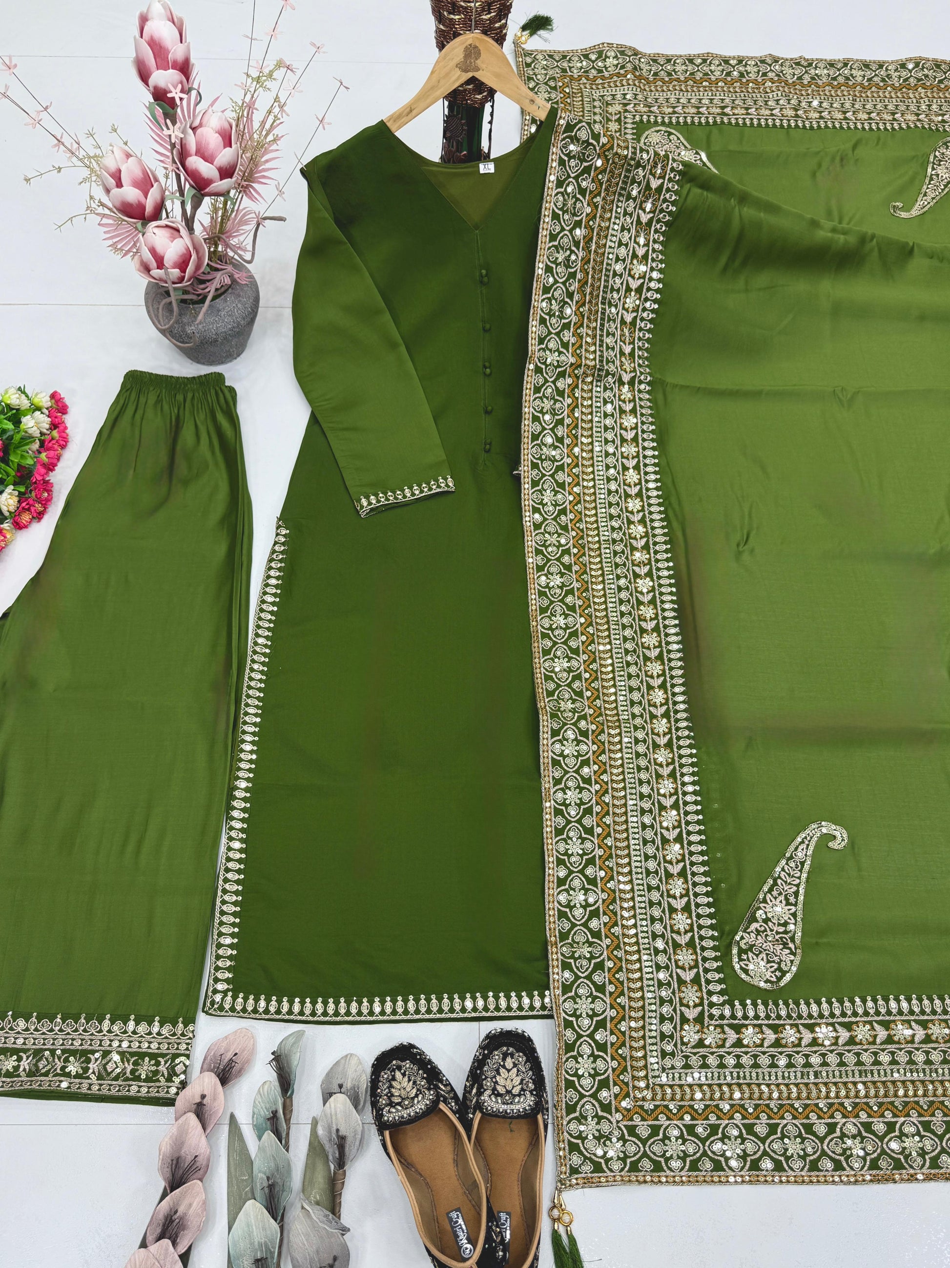 Green Pakistani suit set made of heavy Roman silk with embroidery and sequin work