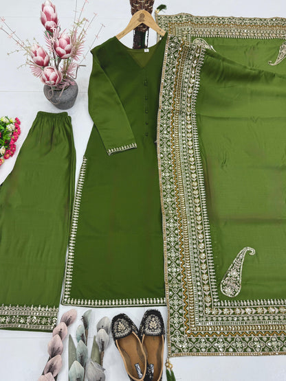 Green Pakistani suit set made of heavy Roman silk with embroidery and sequin work