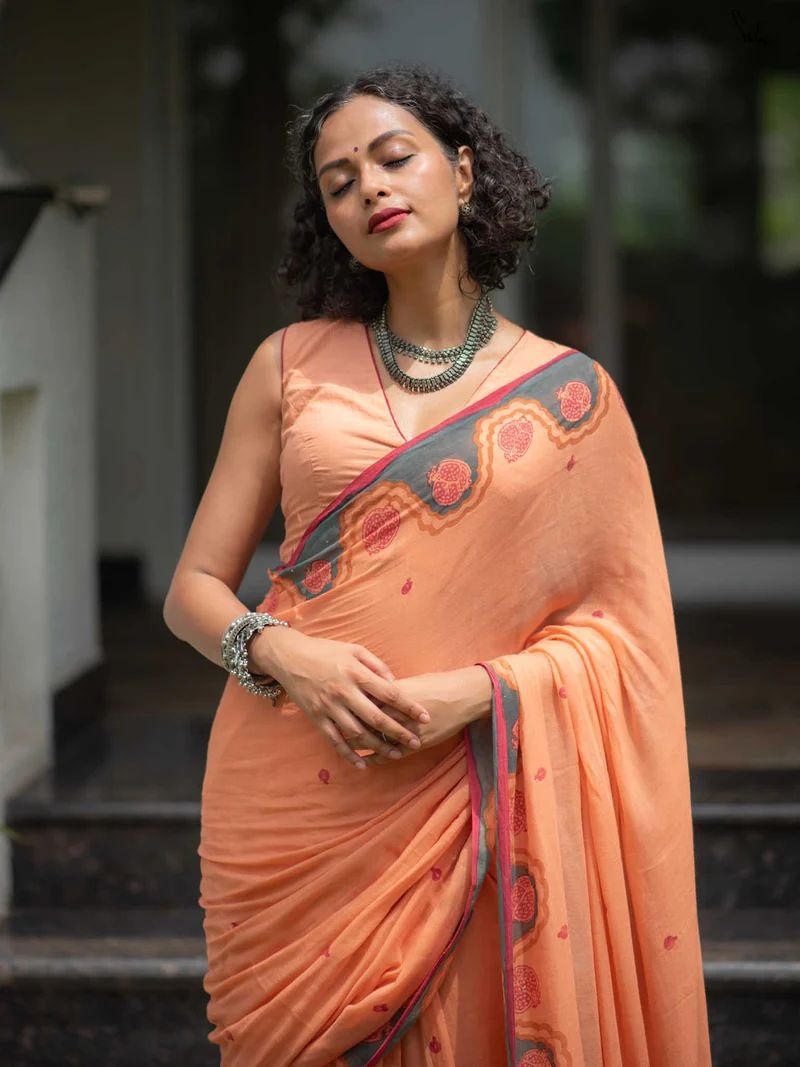 Peach Printed Saree with Contrast Border