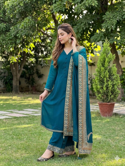 Heavy Roman Silk suit set with intricate embroidery sequences and fancy latkan dupatta